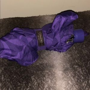 Purple coach umbrella